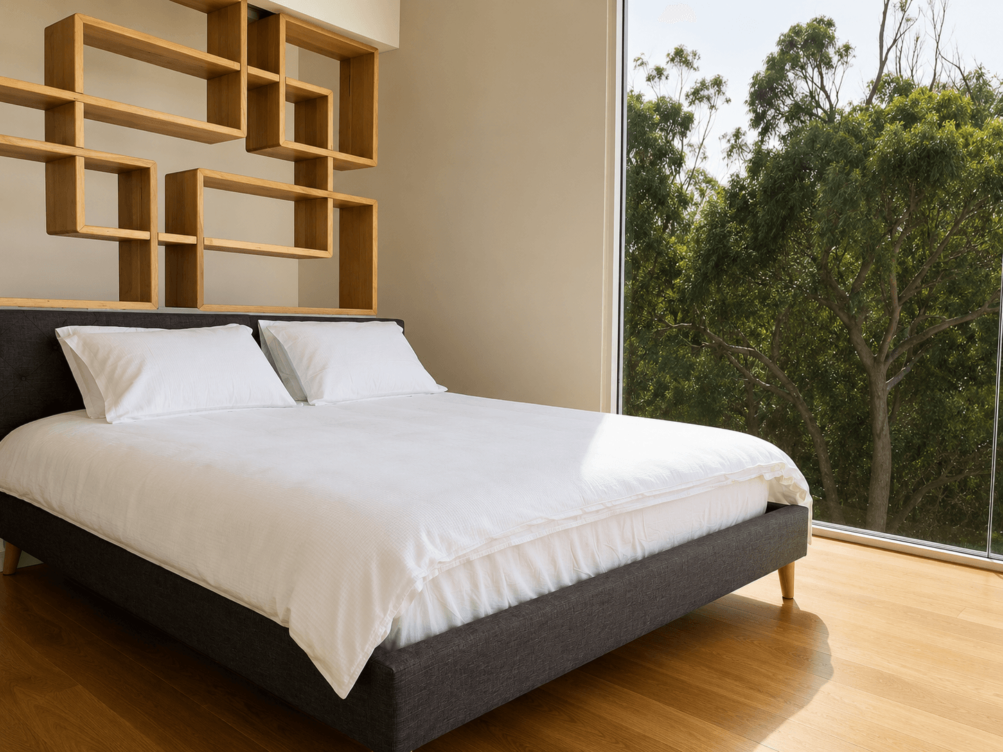Sunlit minimalist bedroom with geometric shelving